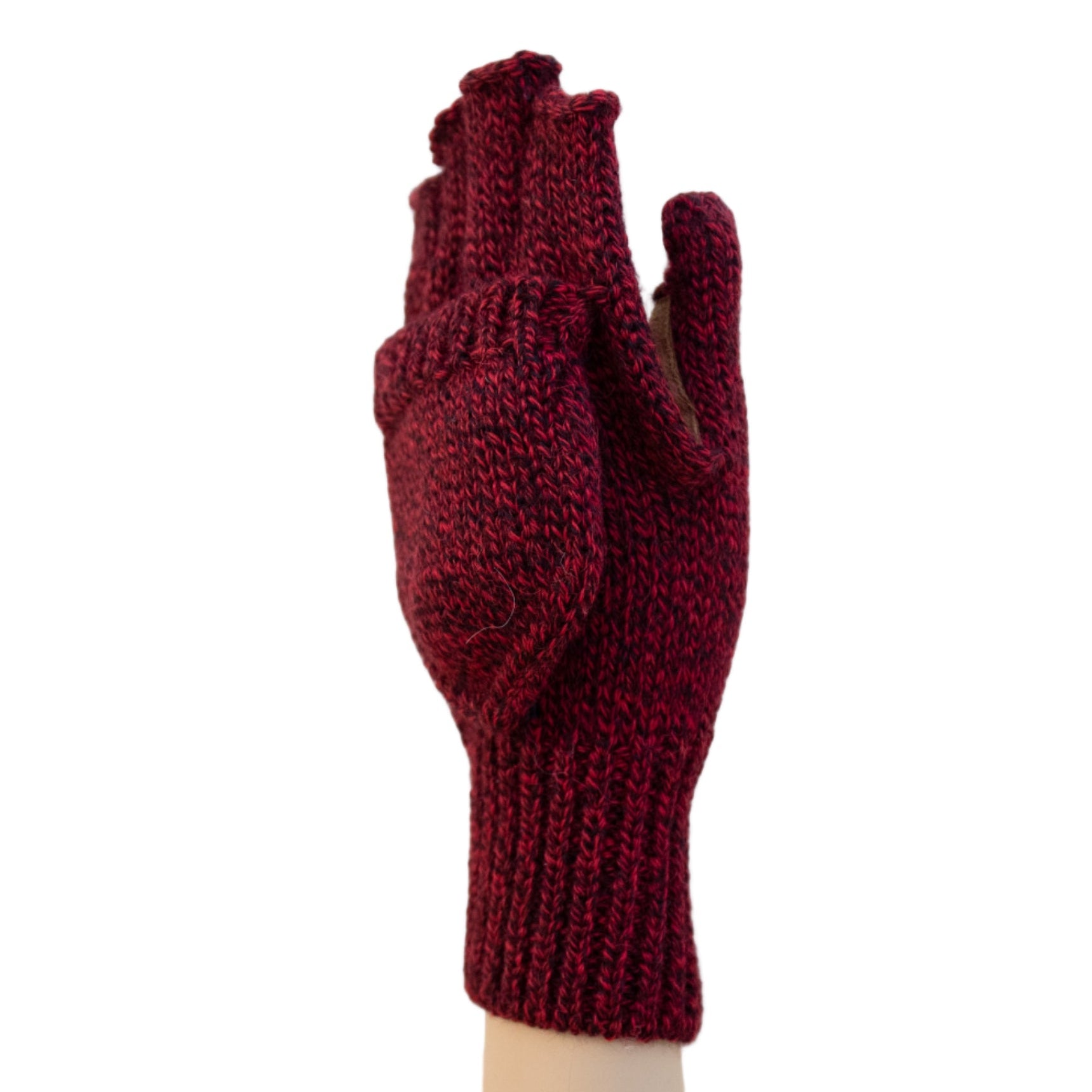 Red knitted glove on a white background