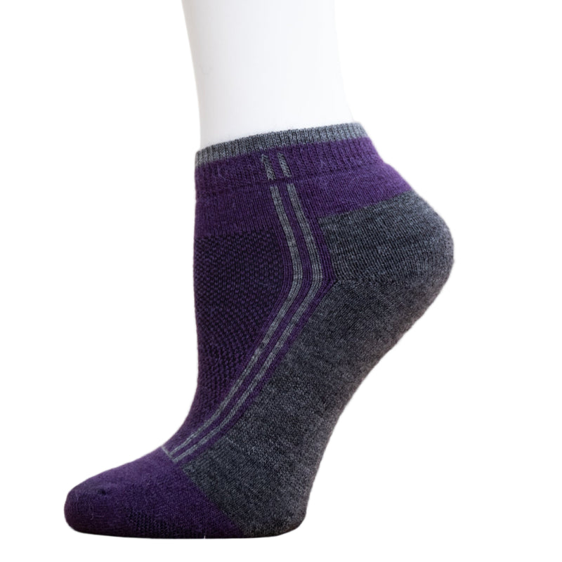 Alpaca Running  and Athletic Ankle Socks. A pair of purple alpaca ankle running socks in front of a white background. 