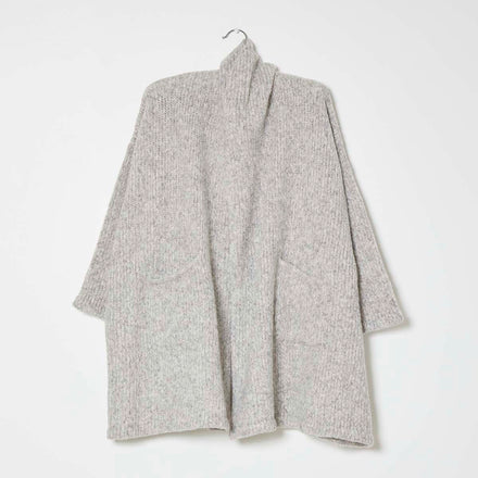 Grey knit wrap coat on white background