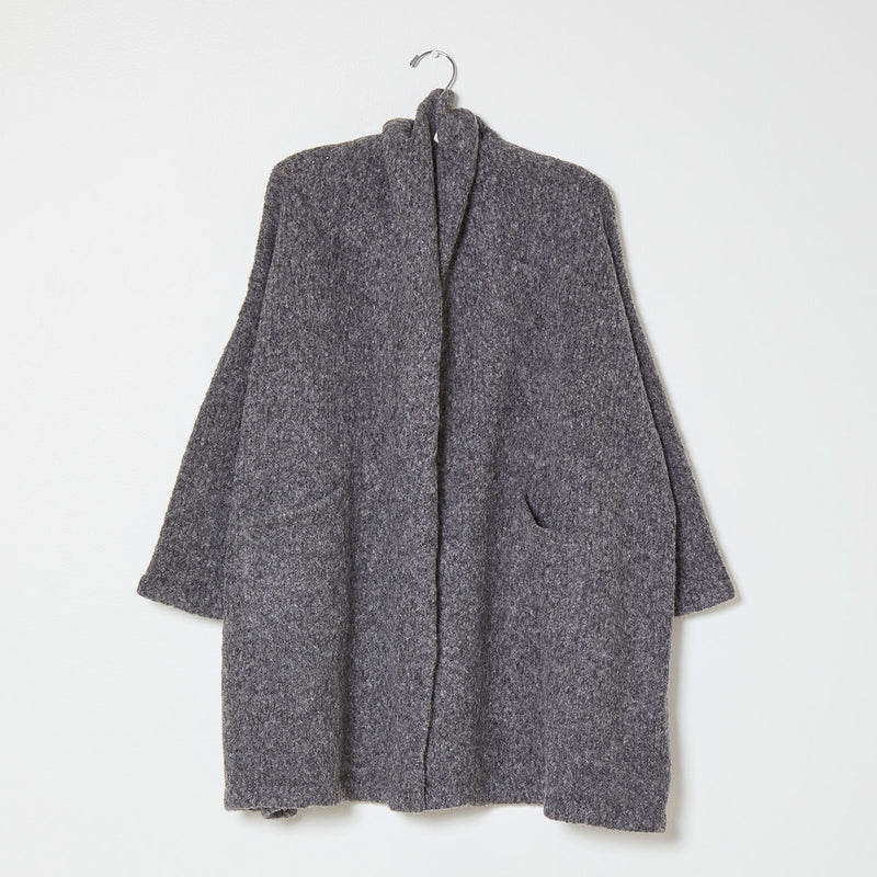 Grey knit wrap coat on white background