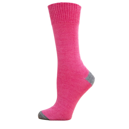 A pink Perilla alpaca sock with a ribbed band and a small amount of gray at the toe and heel.
