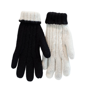 Pair of black and white gloves on a white background