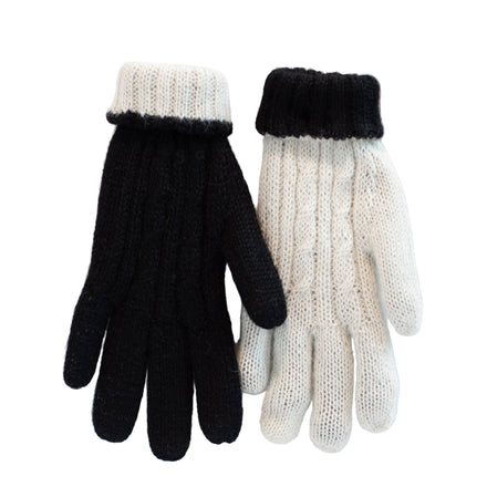 Pair of black and white gloves on a white background