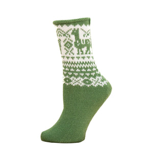 Green and white knitted sock with a pattern on a wooden surface