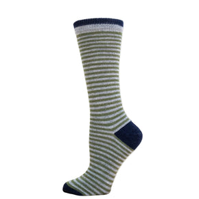 Striped sock with green and blue pattern on a wooden block against a white background