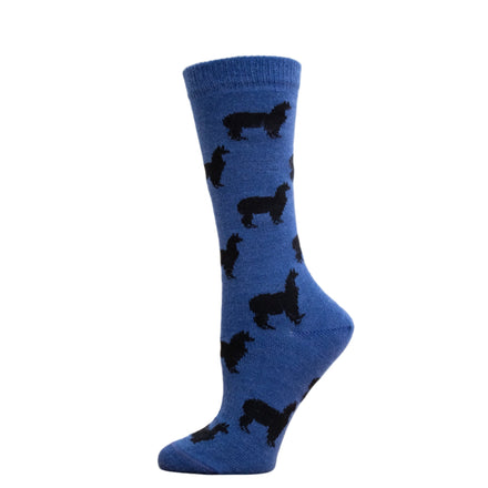 A blue sock featuring a pattern of black alpaca silhouettes.