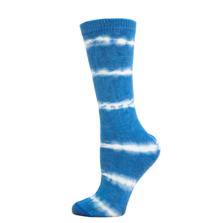 Blue and white striped sock on a wooden block with a white background